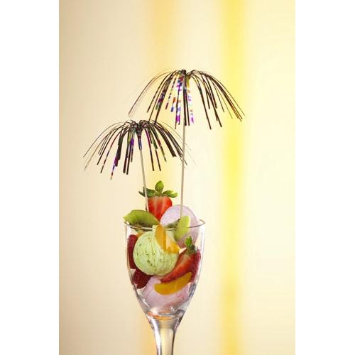 A glass dessert cup with green ice cream, strawberries, kiwi, and orange is topped with two high-quality PAPSTAR 100 decoration picks from PAPSTAR GmbH in firework design - ideal for a stylish presentation against a yellow gradient.