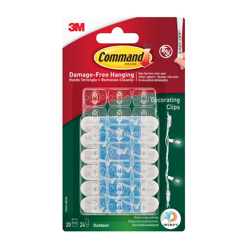 Verpackung mit transparenten Klebehaken in Reihe angeordnet, auf Karton befestigt, freigestellt auf hellem Hintergrund.