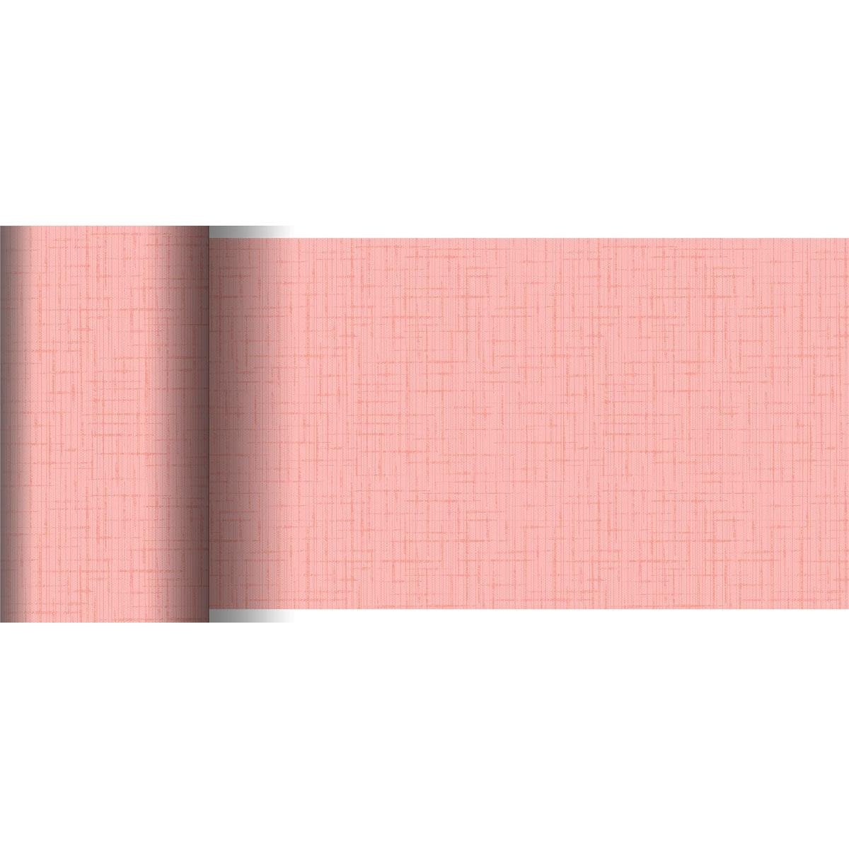 The Duni GmbH Dunicel table runner (20 m x 15 cm) in pink has a subtle linear pattern and a textured grid appearance - perfect for creative table decoration. Both the rolled and unrolled views are shown on a flat surface.