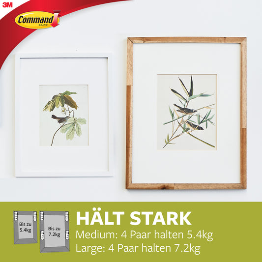 Zwei gerahmte botanische Drucke, ein kleiner und ein großer, hängen nebeneinander an einer weißen Wand. Deutscher Text und Bilder zeigen unterschiedliche Gewichtsgrenzen für Command™ Bilder-Montage-Strips Multi-Pack 17209 (4 x 2), von 3M Deutschland GmbH.
