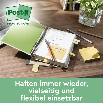 A desk with an open notebook, yellow sticky notes, pens, a plant, and a stack of Post-it® Recycling Notes (76 x 76 mm, 100 sheets/pad, 100% PEFC) from 3M Deutschland GmbH. German text: "Stick again and again, versatile and flexible to use."