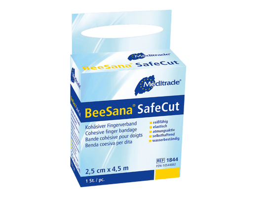 Eine Schachtel BeeSana® SafeCut Fingerpflasterverband von Meditrade GmbH auf grünem Hintergrund. Die Schachtel ist weiß und blau mit einem Text, der den Produktnamen und die Größe (2,5 cm) angibt.