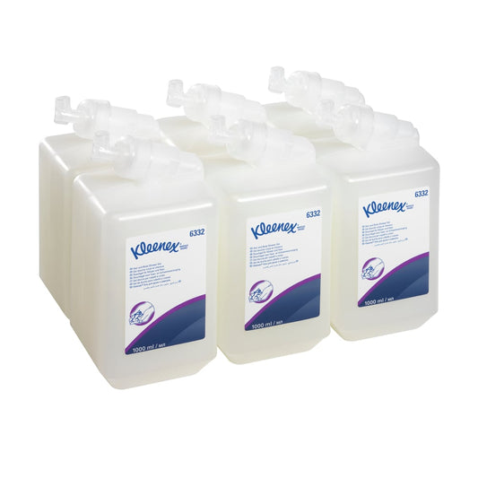 Sechs 1L-Kassetten Kleenex® Haar- und Körpershampoo von Kimberly-Clark GmbH sind in zwei Dreierreihen auf weißem Grund angeordnet - ideal für sanfte Reinigung und Pflege in jedem Umfeld.