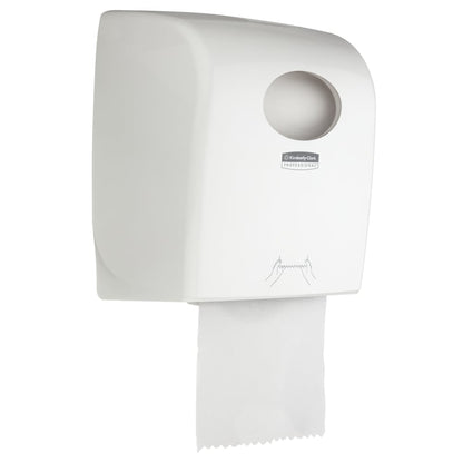 The Aquarius™ roll towel dispenser - White by Kimberly-Clark GmbH is a hygienic wall dispenser for public areas with visible paper towel, round refill opening at the top, and operating instructions in the form of hand drawings.