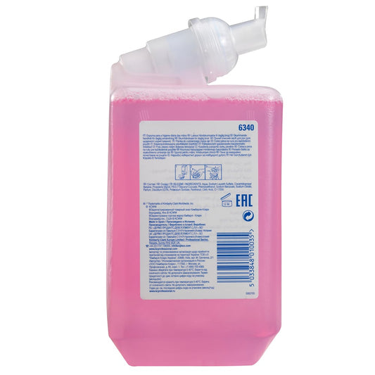 Eine rosafarbene 1L Scott® Essential™ Schaumseife Nachfüllkassette von Kimberly-Clark GmbH mit klarer Spenderkappe und beschrifteter Vorderseite - ideal für die tägliche Verwendung; kommt in einem Karton mit 6 Kartuschen.