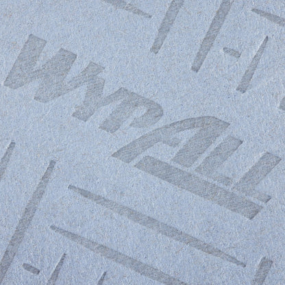 Close-up of the blue, 2-ply WypAll® L20 paper wipe from Kimberly-Clark GmbH with embossed "WypAll" and lines - ideal for central dispensing during maintenance work, 6 rolls of 400 sheets per box.