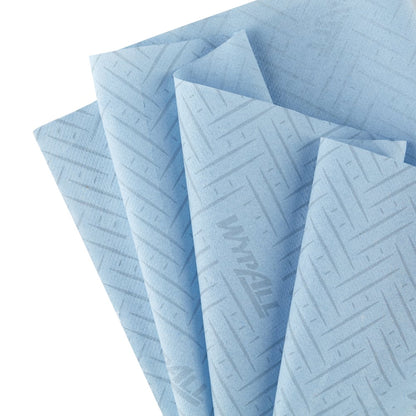 Six blue, 1-ply WypAll® L10 paper towels from Kimberly-Clark GmbH for food & hygiene, central dispensing, are shown overlapping - with a fine diagonal line pattern and brand name.