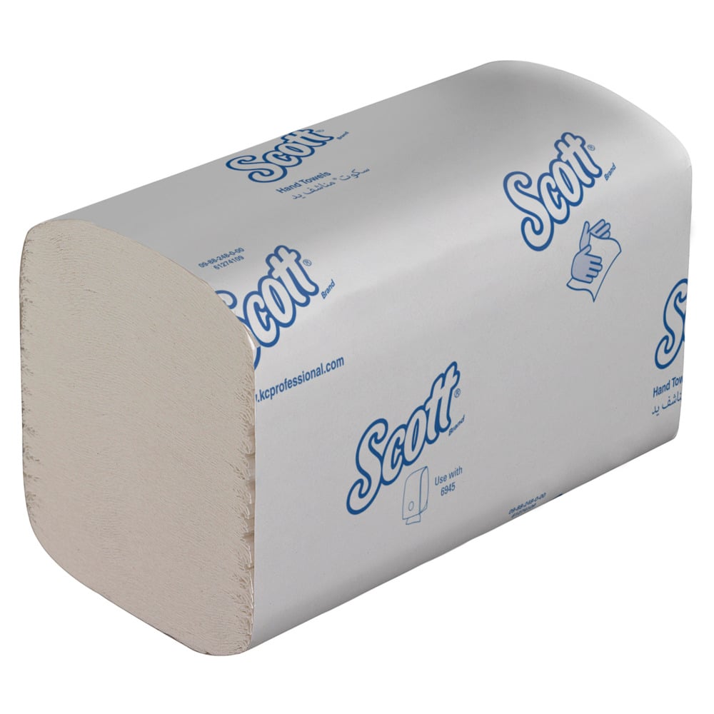 A stack of folded Scott® Control™ Hand Towels in white packages, labeled with blue text and symbols for hand drying. Each carton contains 15 small packages (each 304 sheets) from Kimberly-Clark GmbH.