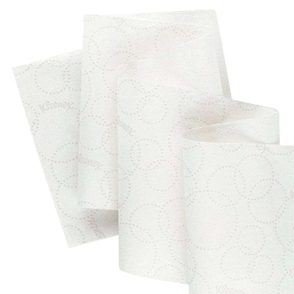 Kleenex® roll towels E-roll Large from Kimberly-Clark GmbH made of white, 1-ply recycled paper with a subtle dot pattern and faint branding - ideal for hygienic hand drying (6x250m rolls per carton).