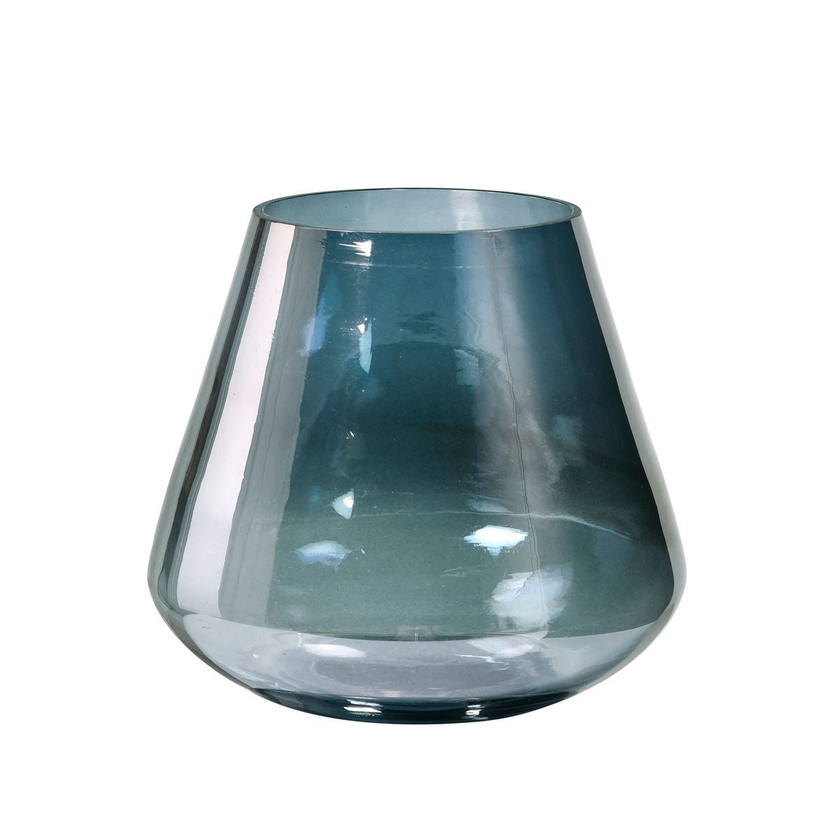 The glass candle holder Etna by Duni GmbH (14.5x16.5 cm) features a translucent, blue-gray design with a wide, rounded base and a reflective surface. Photographed empty against a white background; perfect as an elegant table decoration.