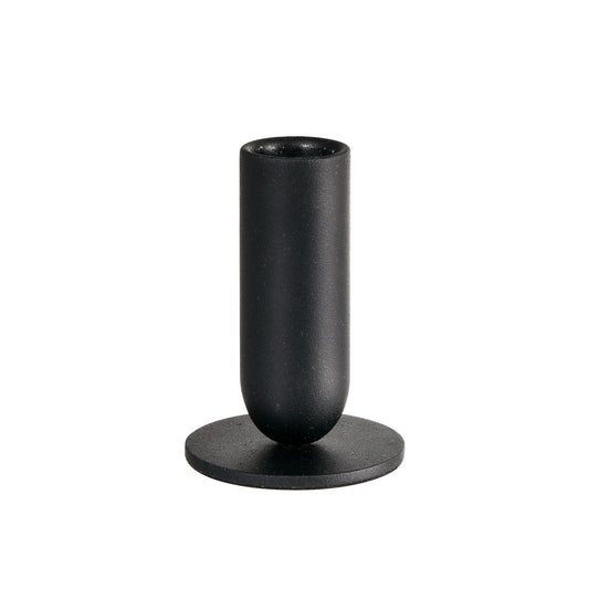 Der Kerzenhalter Metall, 5,7x8cm Totem von Duni GmbH hat ein schwarzes, zylindrisches Design mit einem runden, flachen Sockel, der ihn zu einem stilvollen Dekorationselement für jeden Raum macht.