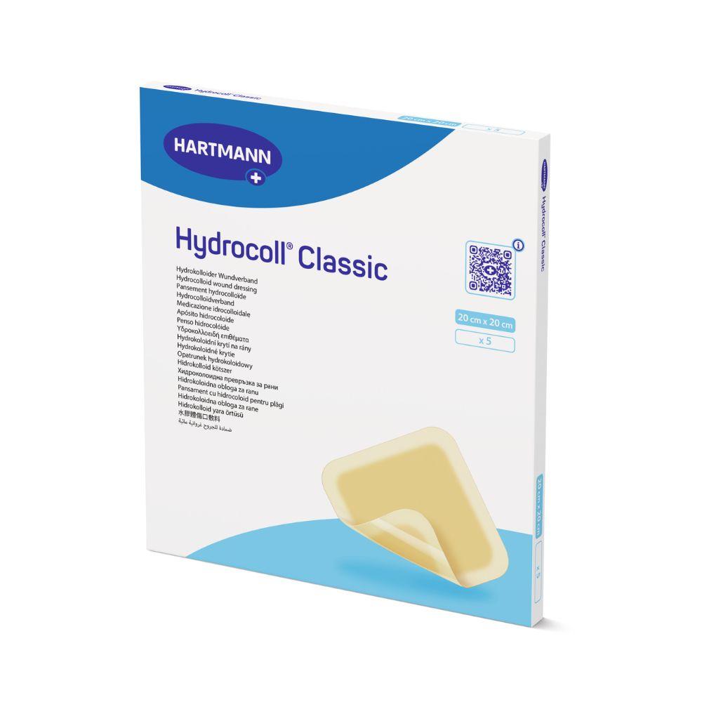 A white-blue box labeled “Hartmann Hydrocoll Classic sterile dressing, individually sealed” from Paul Hartmann AG, 20 cm x 20 cm, 5 pieces, for moist wound treatment with a beige dressing image in the lower right corner of the packaging.