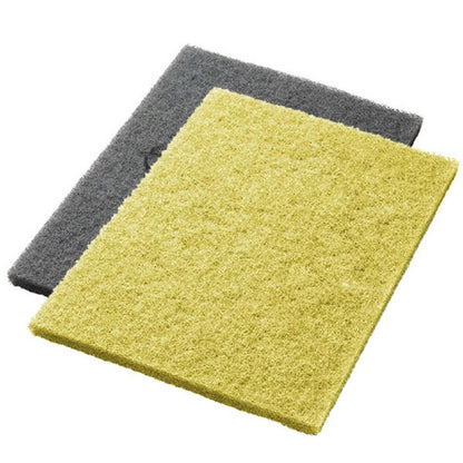 Auf weißem Untergrund liegen zwei gelbe Twister Pads (Restaurierungs-Pad für Steinböden, 2 Stk.) der Diversey Deutschland GmbH & Co. OHG – ideal zum Reinigen und Polieren von Marmor- oder Granitoberflächen.