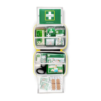 The First Aid Kit MEDIUM from Orkla Wound Care AB offers labeled compartments with bandages, a resuscitation mask, scissors, wound cleaner, burn gel, and plasters in a compact soft case - neatly organized.