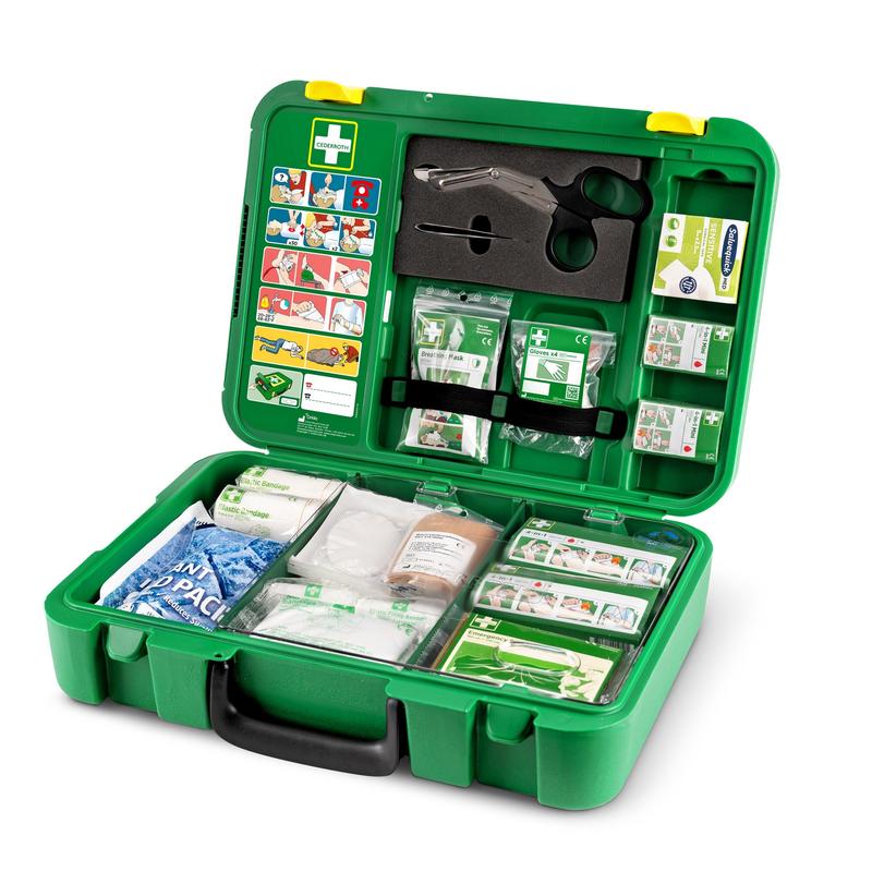 The Orkla Wound Care AB First Aid Kit DIN | Package (1 piece) in green is shown unfolded and contains bandages, scissors, a cold pack, gauze, adhesive tape, and tools. All medical materials are organized and easily accessible in the compartments.