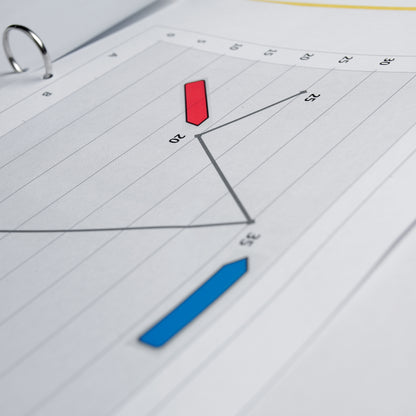 A close-up of a line chart in a folder with red and blue data points. 3M Deutschland GmbH Post-it® Index Arrows, Various Colors, 11.9 mm x 43.2 mm (100 sticky notes/dispenser) mark important document organizing sections.