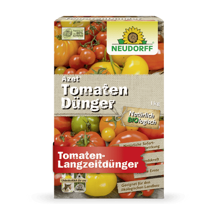 A rectangular box of Azet Tomato Fertilizer from Neudorff Shop with tomato images, branding, and German text highlights the organic formula for long-term fertilization and abundant tomato harvests.