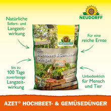 A bag of Neudorff Shop Azet Raised Bed & Vegetable Fertilizer stands upright, with green text about the natural long-term effect, the safe application near humans and animals, and the improved yield. Images of vegetables and herbs adorn the background.