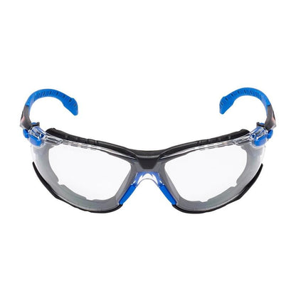 The 3M™ Solus™ Safety Glasses 1000 from 3M Deutschland GmbH feature clear lenses, a black frame with blue accents and curved temples, a wraparound design, a Scotchgard™ anti-fog coating, and a removable foam gasket. Pictured on a white background.