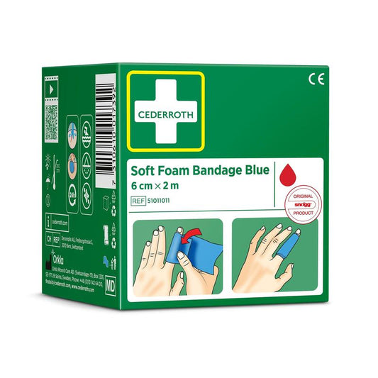 Auf einer grünen Schachtel Cederroth weichschaumbinde blau 6 cm x 2 m (1 Stück) von Orkla Wound Care AB sind der Produktname, Anwendungsbilder und Zertifizierungssymbole auf der Verpackung abgebildet.