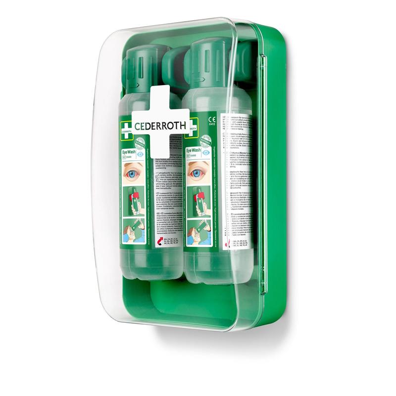 Der Cederroth Augenspülschrank 1x1 von Orkla Wound Care AB ist eine grüne, an der Wand montierte Notfall-Augenspülstation mit einer transparenten Abdeckung, die zwei klar beschriftete Flaschen hält und auf der Vorderseite mit Anweisungen und Sicherheitssymbolen versehen ist.