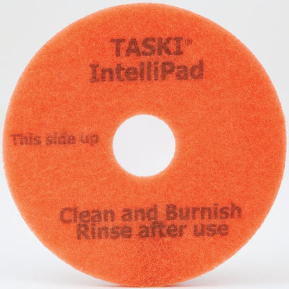 The TASKI Intellipad Combined Cleaning and Polishing Pad for maintenance cleaning from Diversey Deutschland GmbH & Co. OHG cleans and polishes floors effectively - with marking "This side up, Clean and Burnish, Rinse after use" and center hole.