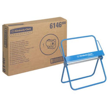 Pictured is a blue metal wall holder for large rolls from Diversey Germany in front of a brown box with the inscription "6146" and product details; delivery time approx. 4 weeks, package contains 1 piece.