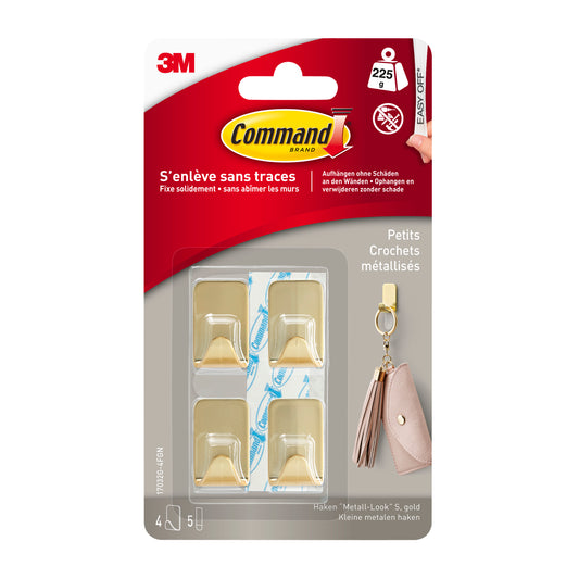 Eine Packung Command™ Metallhaken Größe S in Gold von 3M Deutschland GmbH enthält 4 Haken und 5 Streifen zum beschädigungsfreien Aufhängen; die Verpackung enthält Angaben in Französisch und Deutsch.