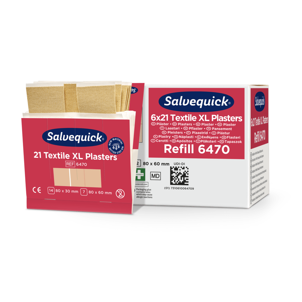 Pictured are two Orkla Wound Care AB XL textile plaster boxes (21 pieces/package, 6 pieces) - one open with bandages, one closed. For small injuries; sizes: 80x30 mm, 80x60 mm; Ref: 6470. Piece counts: 21/126.