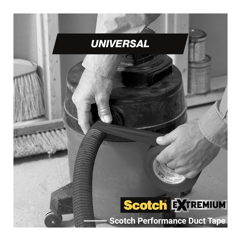 A person wraps Scotch® Extremium™ Universal Adhesive Tape, 3 m x 19 mm from 3M Deutschland GmbH around a workshop vacuum hose connection in a workshop. The image shows the bold labels "UNIVERSAL" and "Scotch EXTREMIUM".