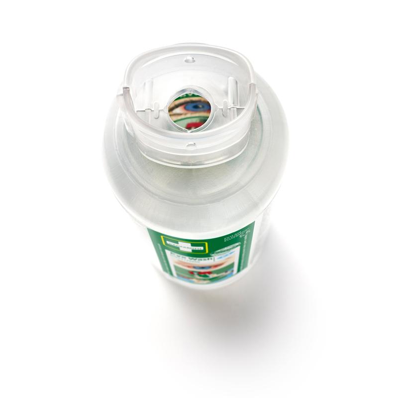 Nahaufnahme einer Flasche Cederroth Augenspülung 2 x 500 ml (2er-Pack) von Orkla Wound Care AB von oben, mit durchsichtigem Flip-Top-Verschluss und grün-weißem Etikett, das die Verwendung bei Augenunfällen angibt. Ein Teil des Etiketts ist durch die Öffnung des Verschlusses sichtbar.