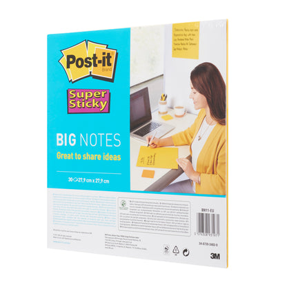 Pictured is a pack of 3M Post-it® Super Sticky Big Notes BN11-EU (279 mm x 279 mm, Yellow, 30 sheets/block, 1 block/pack, 100% PEFC-certified) with blue and yellow labeling and a woman writing on yellow sticky notes at a laptop.