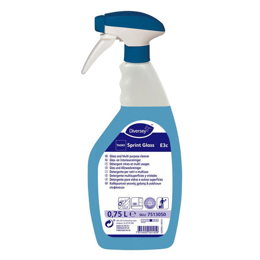 Eine weiß-blaue Sprühflasche TASKI Sprint Glass Glas- und Oberflächenreiniger von Diversey Deutschland GmbH & Co. OHG, 0,75 l, für streifenfreies Reinigen, mit Produktinfo und Gebrauchsanweisung auf dem Etikett.