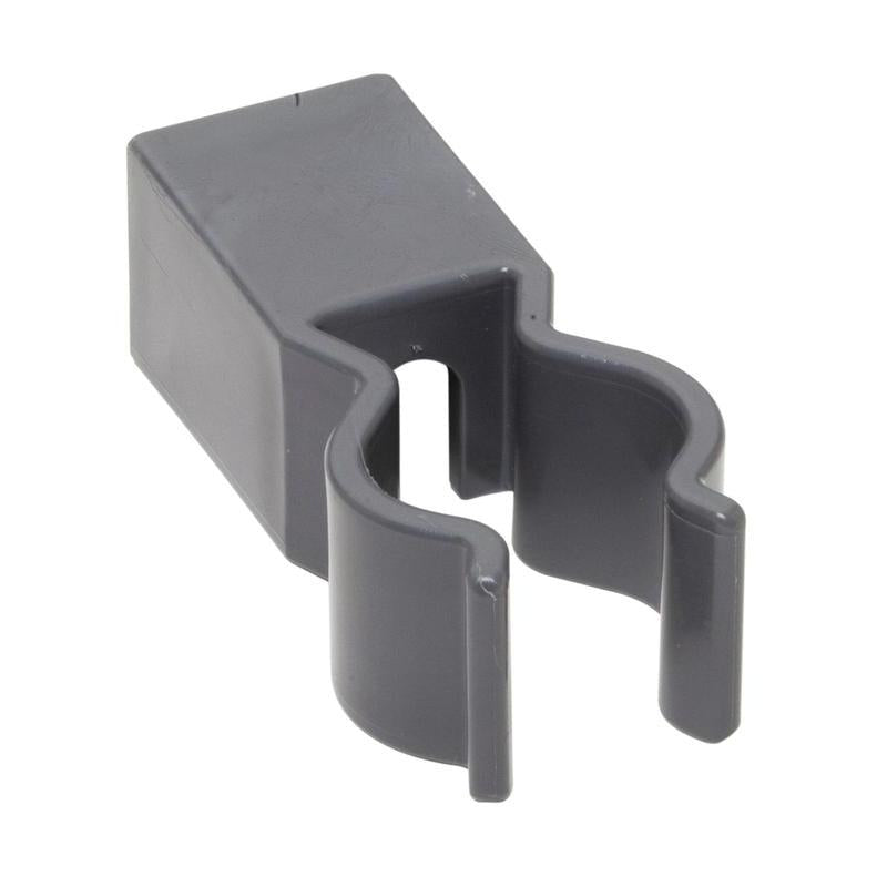 The TASKI holder for bag storage from Diversey Deutschland GmbH & Co. OHG is a grey plastic clip with a rectangular base and U-shaped opening, designed for attachment to aluminum profiles in waste disposal and features gentle curves for holding cylindrical objects.