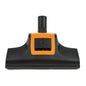 The Diversey TASKI AERO Turbo Vacuum Brush in Black and Orange is equipped with two switches and fits the TASKI AERO models to ensure efficient cleaning. Pictured is a floor head attachment (1 piece) on a white background.