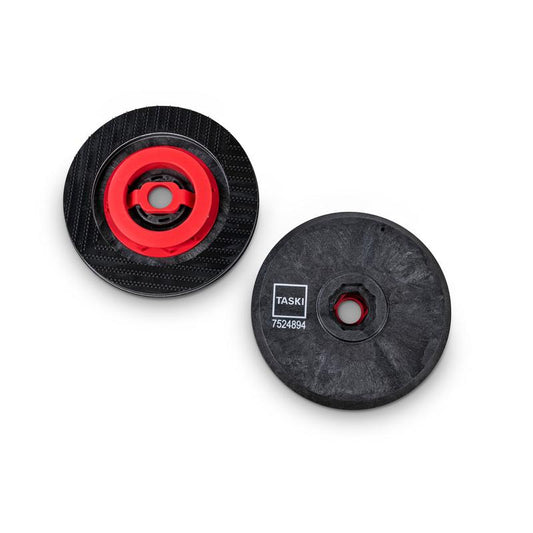Abgebildet sind zwei schwarze runde Führungssteller-Pads der Diversey Deutschland GmbH & Co. OHG, für TASKI swingo 250µicro, sind abgebildet - einer mit rotem Innenring, einer mit der Aufschrift "TASKI 7524984" - 2er-Packung pro Karton.