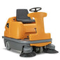 The TASKI balimat 6500 RTU from Diversey is a battery-operated, robust ride-on sweeper with 2 roller brushes, side brushes, 4x180 Ah batteries, and charger - ideal for the efficient cleaning of large areas.
