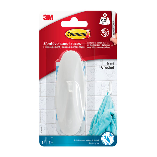 Ein 3M Command™ Bad Large Design-Haken (17083B) der 3M Deutschland GmbH zeigt in seiner Verpackung einen weißen Badhaken, eine blaue Handtuchabbildung, französischen und niederländischen Text, Montagesymbole und eine Gewichtsbegrenzung von 2,2 kg.