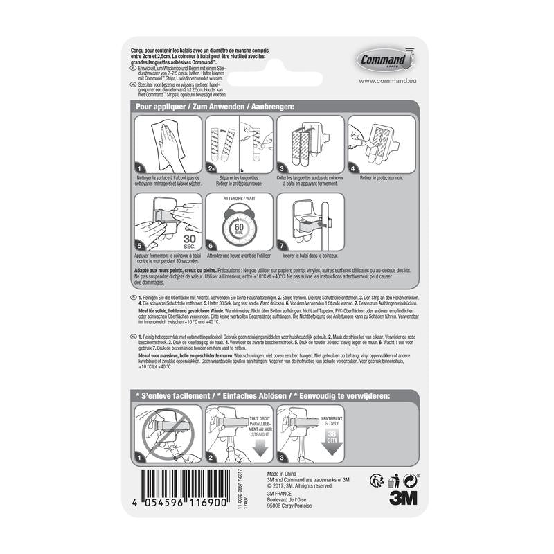 The back of a Command™ broom holder, 17007-FR packaging from 3M Deutschland GmbH, shows a pictorial, multilingual instruction for attaching and removing the holder with Command adhesive strips. Diagrams guide step by step through the assembly and disassembly.