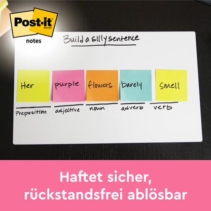Ein Whiteboard zeigt "Ihre lila Blumen duften kaum" mit bunten Post-it® Notes (Pink, 76x76mm, 100 Blatt/Block, 6 Blöcke/Packung, 3M Deutschland GmbH). Oben links: Post-it Notes Logo. Unten: "Haftet sicher, rückstandsfrei ablösbar.