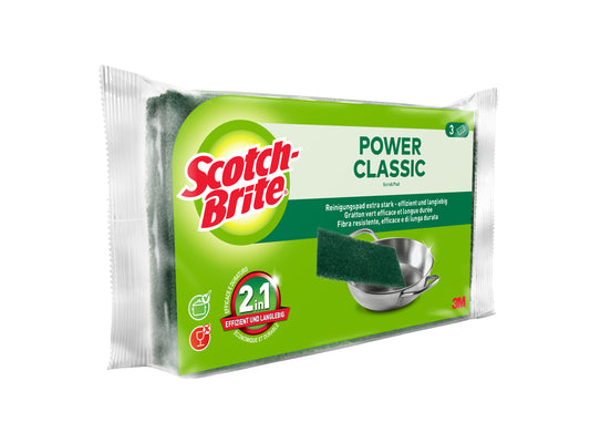 Eine 3er-Packung Scotch-Brite® Classic Scheuerpads der 3M Deutschland GmbH, abgebildet mit grünen Pads und Produktbranding, zeigt einen Edelstahltopf auf der Verpackungsfront.