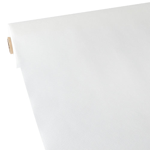 Eine Rolle Starpak Tischdecke, stoffähnlich, Vlies „soft selection“ in Weiß wird auf einer ebenen Fläche ausgerollt, so dass links der glatte, leichte Stoff und die teilweise sichtbare Pappröhre zu sehen sind.