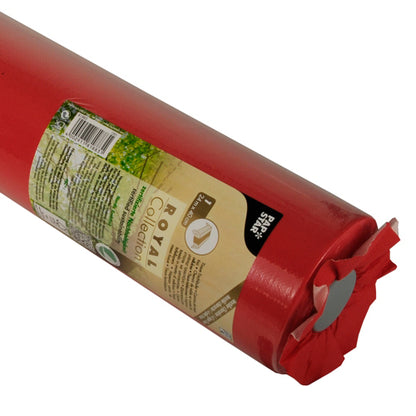 A close-up of a rolled PAPSTAR table runner, Tissue "ROYAL Collection" 24 m x 40 cm from PAPSTAR GmbH, packaged in a clear packaging with a brown-green label with text and symbols.