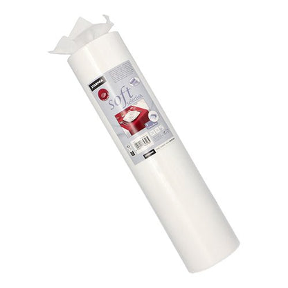 A white roll of Starpak table runner, fabric-like fleece "soft selection" (24 m x 40 cm), shows brand name and product label with red table set, some leaves are slightly pulled out at the top.
