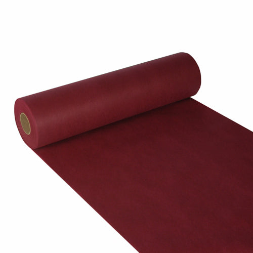 Ein teilweise abgerollter Starpak Tischläufer, stoffähnlich Vlies „soft selection“ (24m x 40cm), in Dunkelrot, ist auf weißem Untergrund mit glatter, matter Oberfläche abgebildet – ideal für stilvolle Dekoration. Das Papier ist um einen Pappkern gewickelt.