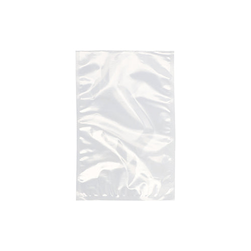 Ein Starpak 100 Siegelrandbeutel, PA/PE transparent von Starpak ist leer und klar vor einem weißen Hintergrund abgebildet. Der rechteckige Kunststoffbeutel, der häufig bei Kammervakuumierern verwendet wird, erscheint flach und leicht zerknittert.