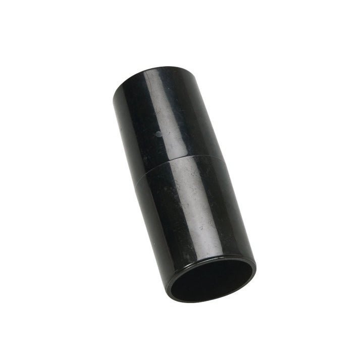 The TASKI cone piece | Pack (1 piece) from Diversey Deutschland GmbH & Co. OHG is a black, cylindrical plastic pipe connector, perfect for cleaning accessories and surface cleaning, shown angled on a white background.