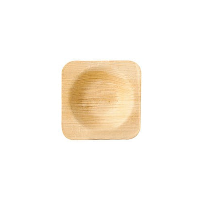 Against a white background lie PAPSTAR 25 bowls, palm leaf "pure" round from PAPSTAR GmbH – perfect as eco-friendly disposable bowls for sustainable events.