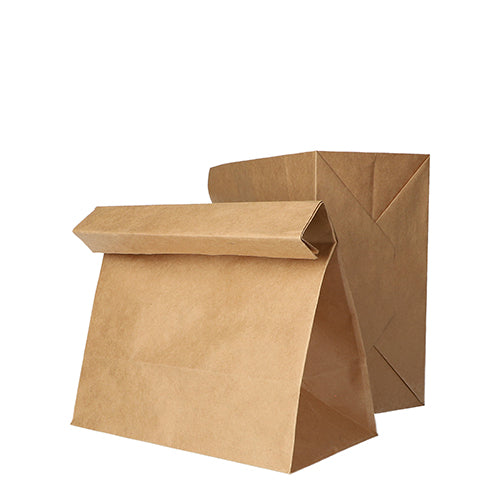 Auf weißem Grund sind zwei PAPSTAR 250 Blockbodenbeutel Kraftpapier braun der PAPSTAR GmbH abgebildet, einer stehend und einer mit heruntergeklappter Oberseite.