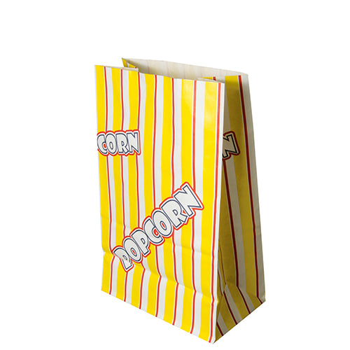 Eine gelbe Popcorntüte der PAPSTAR GmbH aus der 100er-Packung Pergament-Ersatz „Popcorn“ fettdicht weist vertikale rote und weiße Streifen auf, auf denen „POPCORN“ in fetten weißen Buchstaben mit roter Umrandung steht und aufrecht vor einem weißen Hintergrund steht.